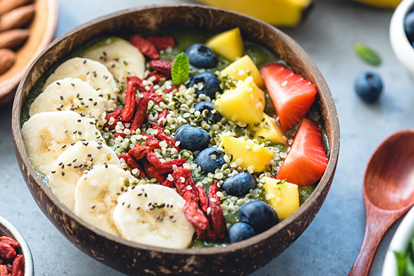 Smoothie bowl with fruit and healthy seeds