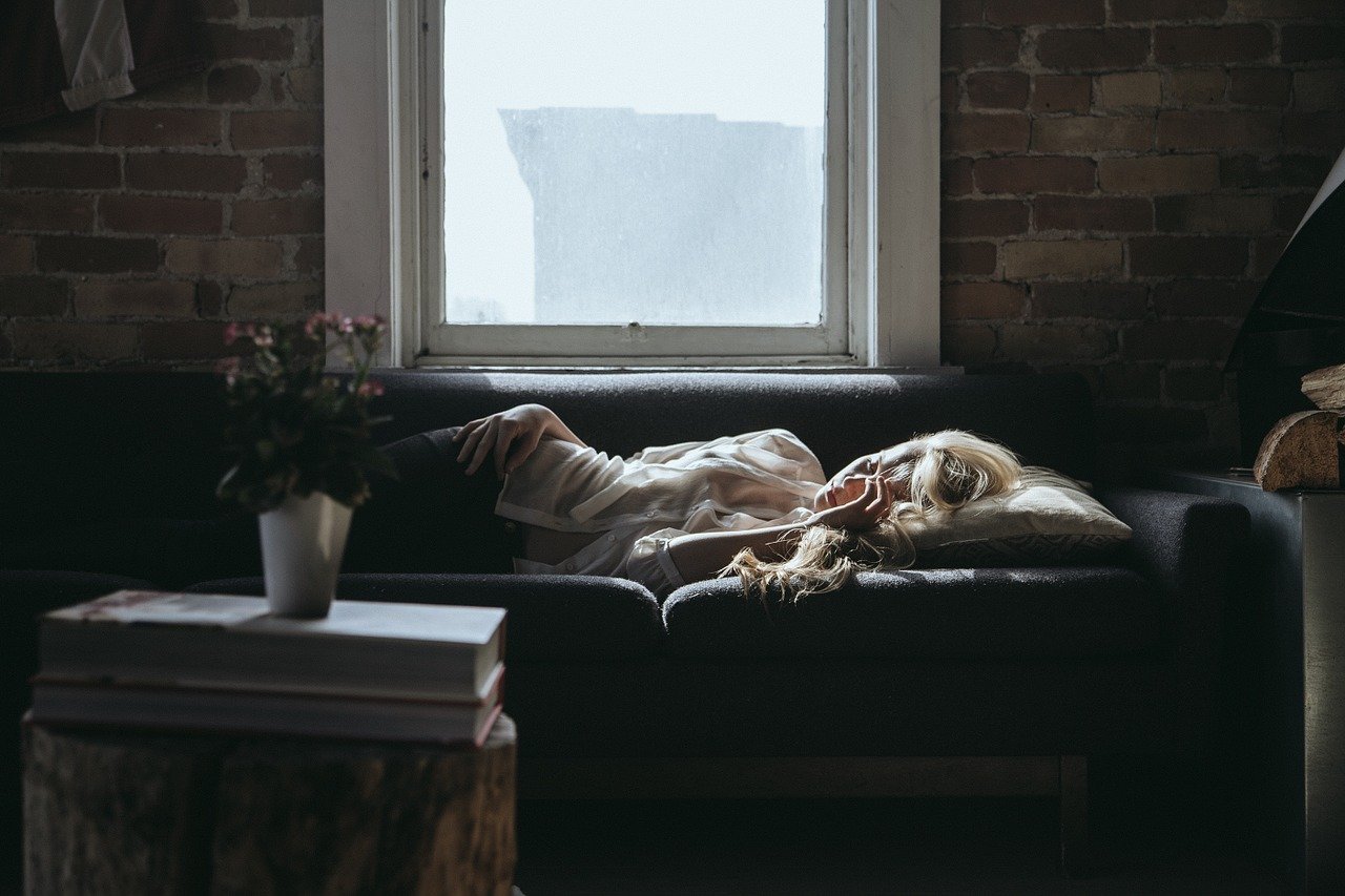 woman napping on the sofa