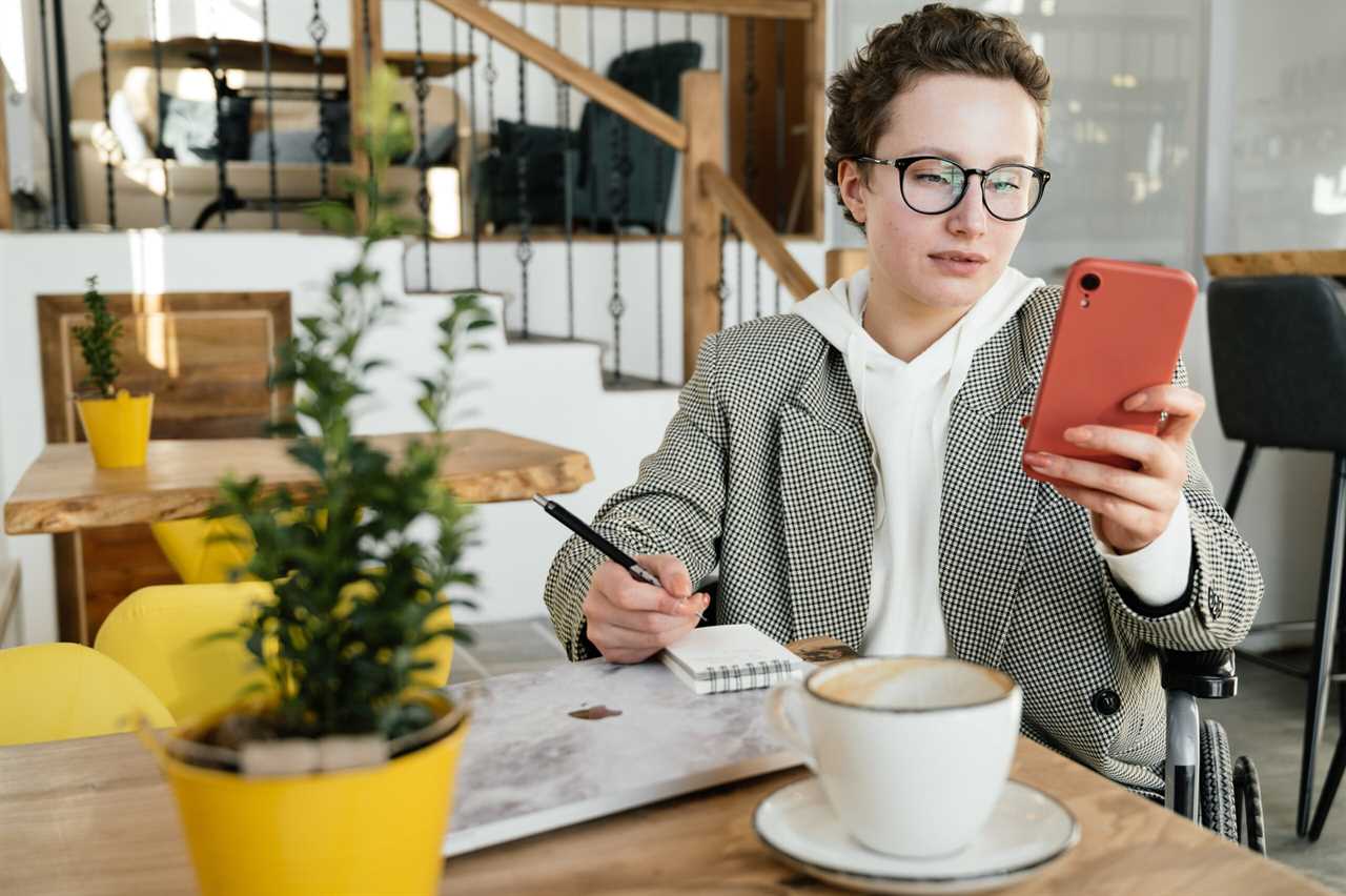 woman checking her period calendar on her iphone to see if keto affects your period