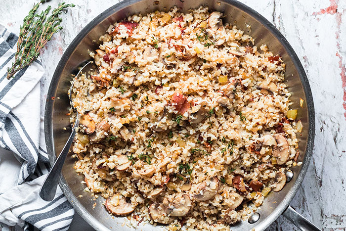 added cauliflower in pan for cauliflower bacon mushroom risotto recipe