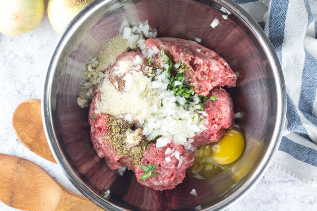 meatball ingredients in a bowl for gluten-free spicy meatballs