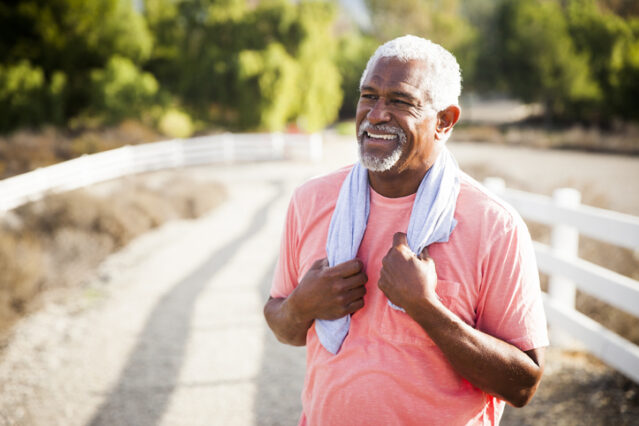 senior man exercising outside