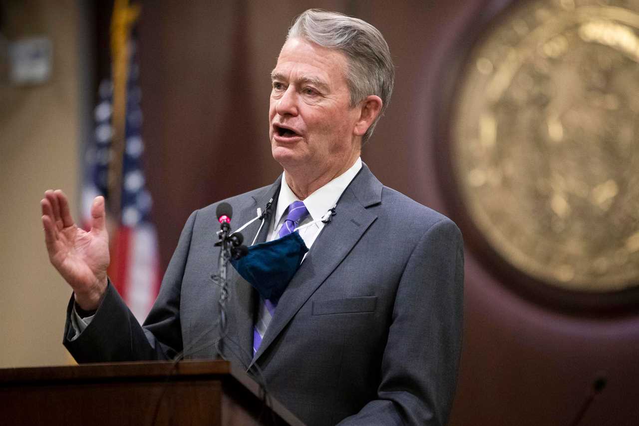 Gov. Brad Little gestures during a press conference at the Statehouse in Boise, Idaho on Oct. 1, 2020.