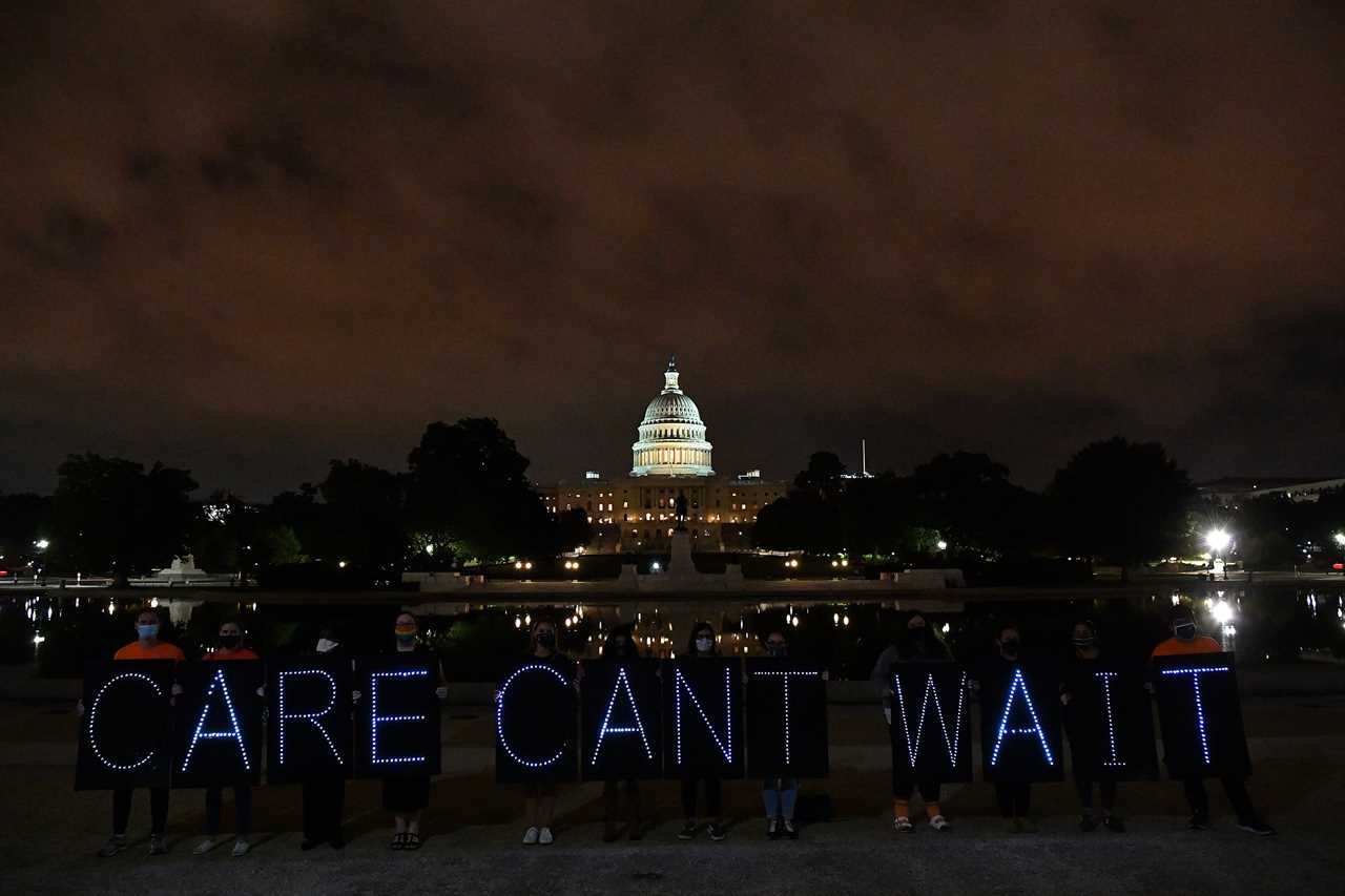 Disability rights activists and caregiving advocates hold a vigil in front of the U.S. Capitol, urging Congress to include full federal funding for home and community based care services in the Build Back Better budget package in Washington, D.C., on Oct. 06, 2021.