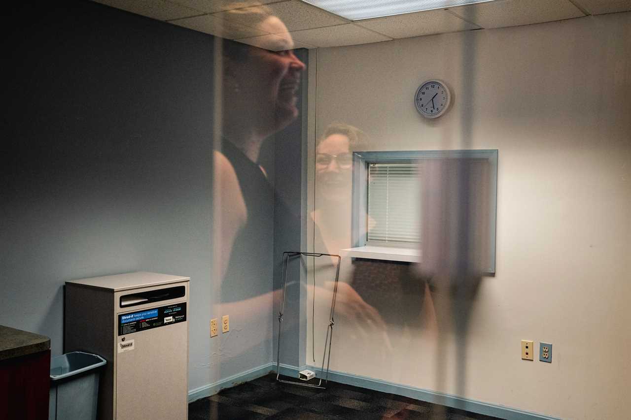 A reflection of OB/GYN Diane Horvath (L) and Certified Nurse-Midwife Morgan Nuzzo, co-founders of Partners in Abortion Care, joking around is seen in an empty space where they plan to start their abortion clinic in College Park, MD, Tuesday, May 31, 2022. (Photo/Shuran Huang)