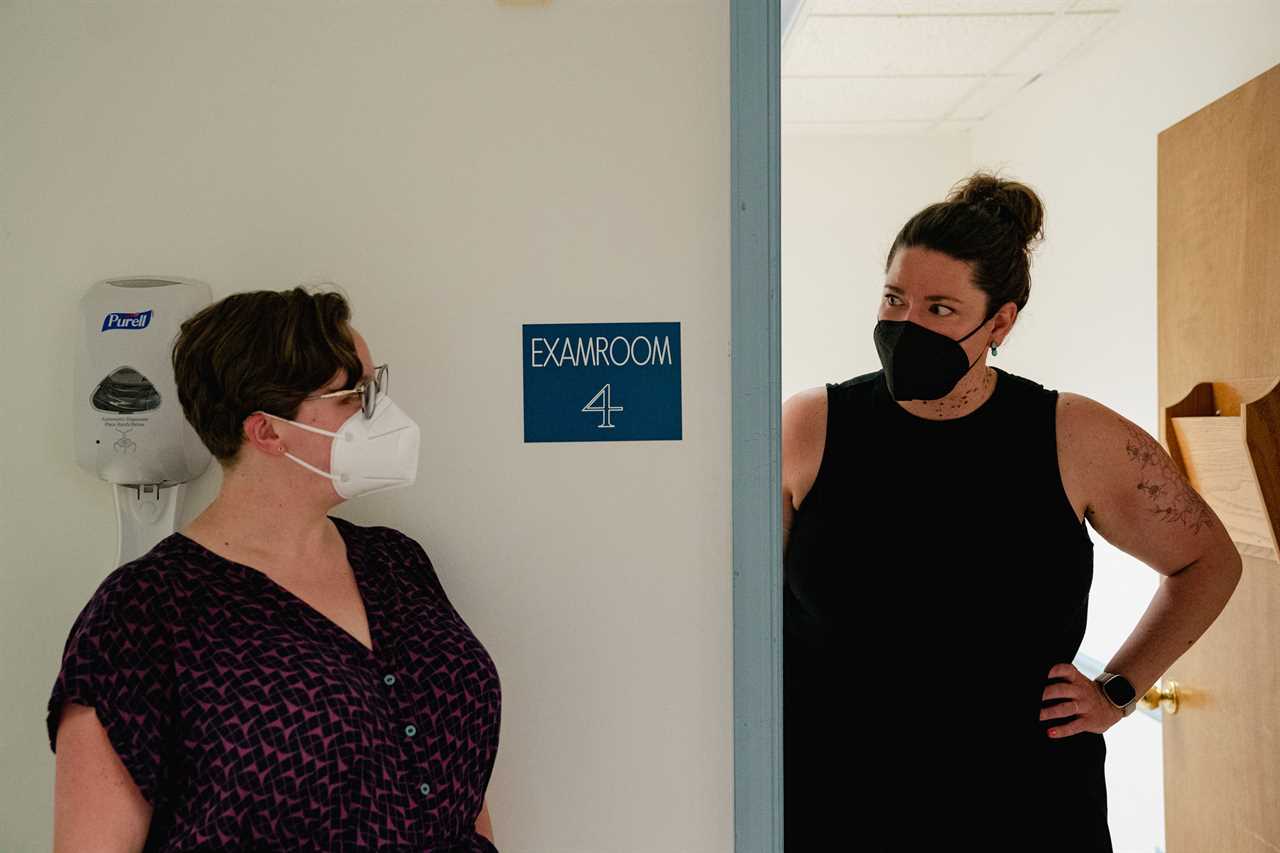 OB/GYN Diane Horvath (L) and Certified Nurse-Midwife Morgan Nuzzo, co-founders of Partners in Abortion Care, joke around as they chat with contractor Reuben Pemberton about renovating an empty space where they plan to start their abortion clinic in College Park, MD, Tuesday, May 31, 2022. (Photo/Shuran Huang)