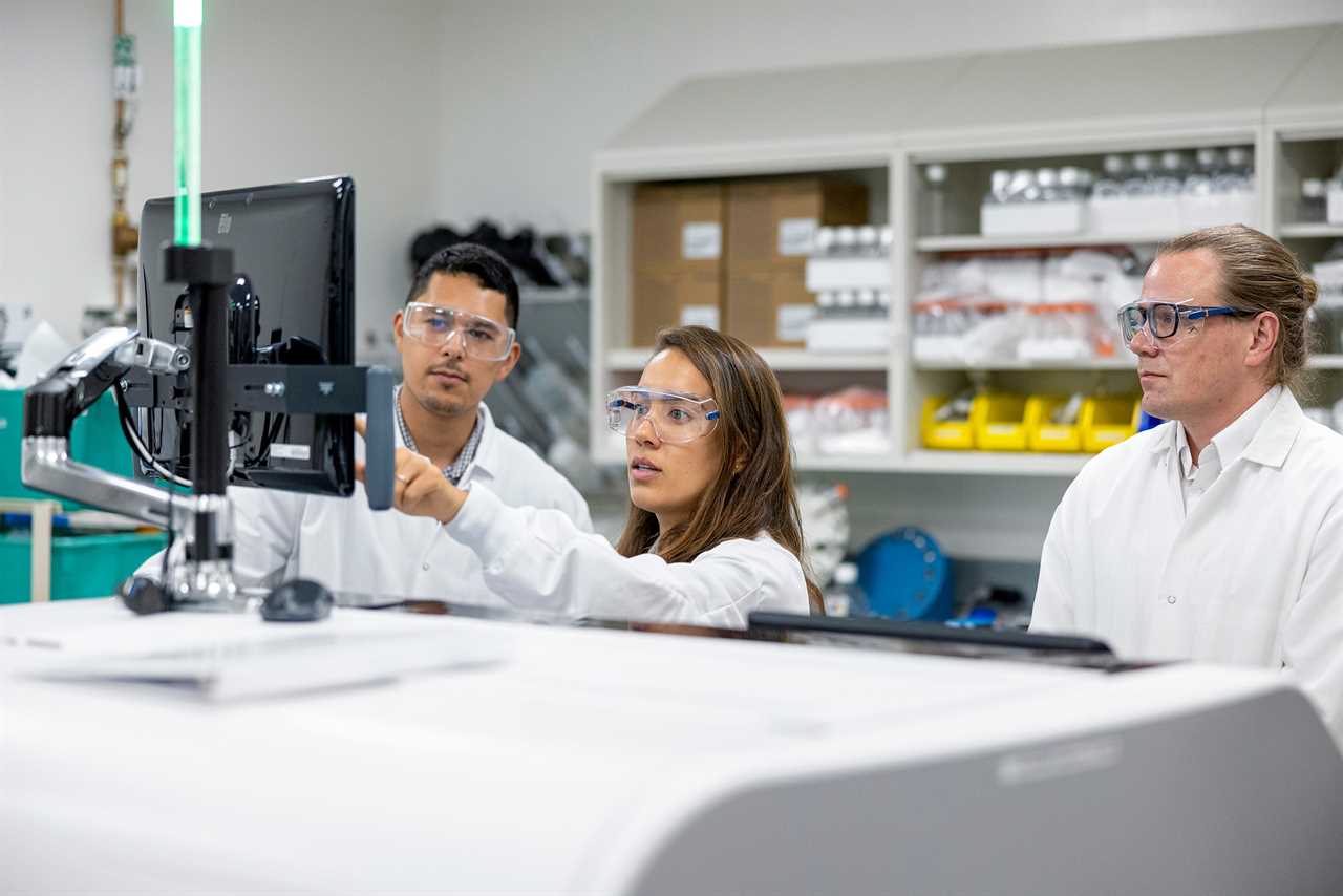 Laboratory technicians during a training at AP8 in Abbott Park, Ill.