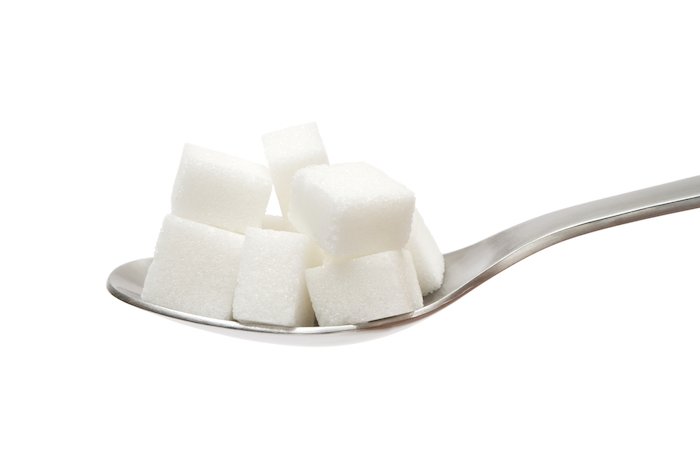 sugar cubes on spoon | sugar craving pills