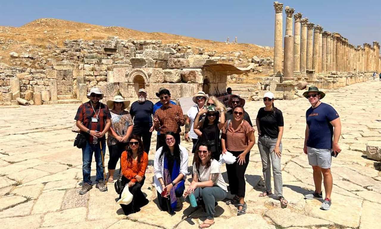A group TNN tour posing for a photo after exploring Jordan together