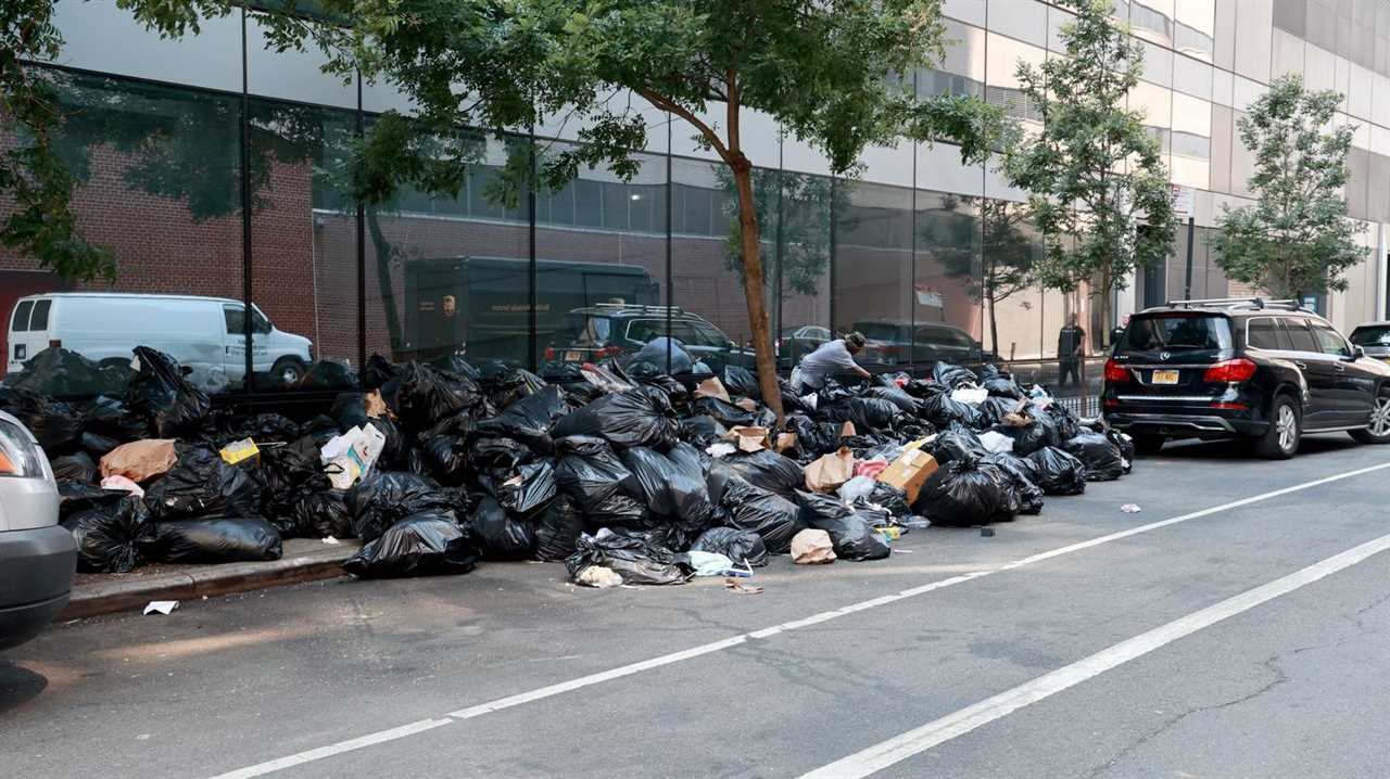 visible trash on sidewalk on 43rd Street between 11th and 12th Avenues in Manhattan, New York in August 2022.