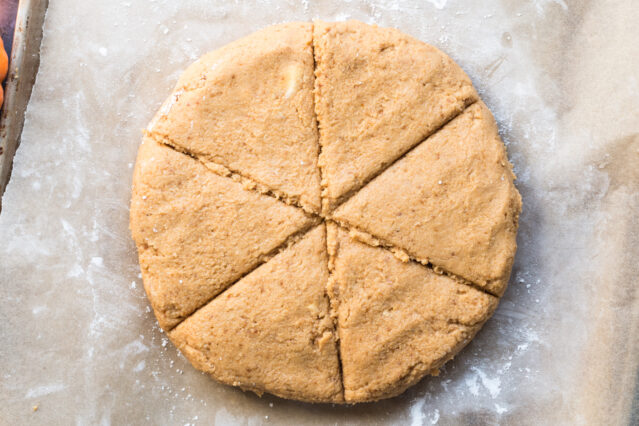 Dough for pumpkin scones on parchment