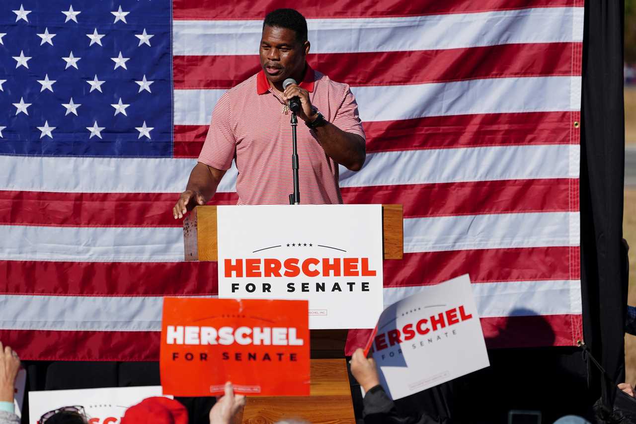 Republican U.S. Senate Herschel Walker campaigns in Cumming, Ga., on Oct. 27, 2022.