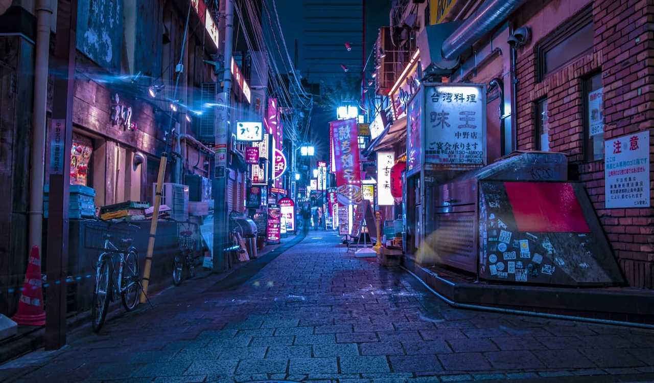 An empty street with glowing lights in Tokyo, Japan