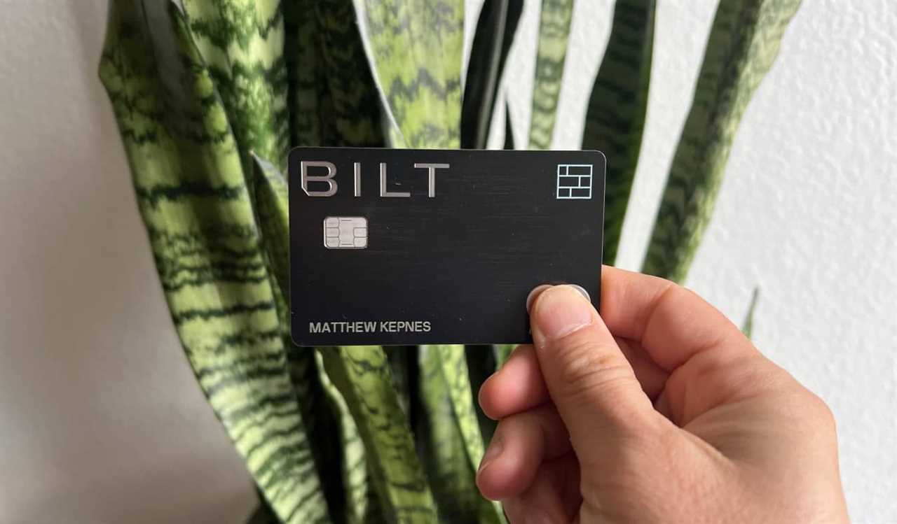 Nomadic Matt's new Bilt Mastercard being held up in front of a snake plant
