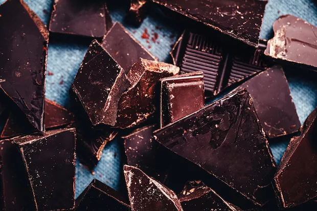 Close-up of dark chocolate, which can help with PMS symptoms