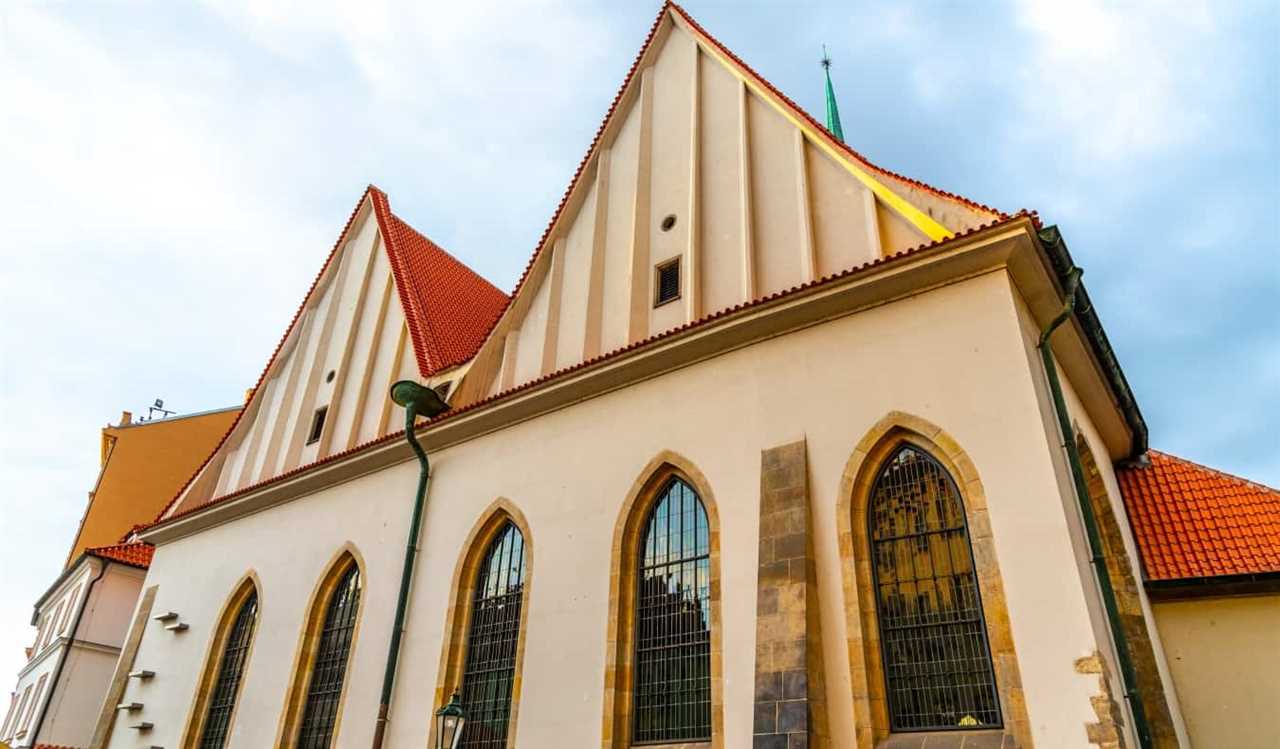 The simple beige facade of Bethlehem Chapel in Prague, Czech Republic