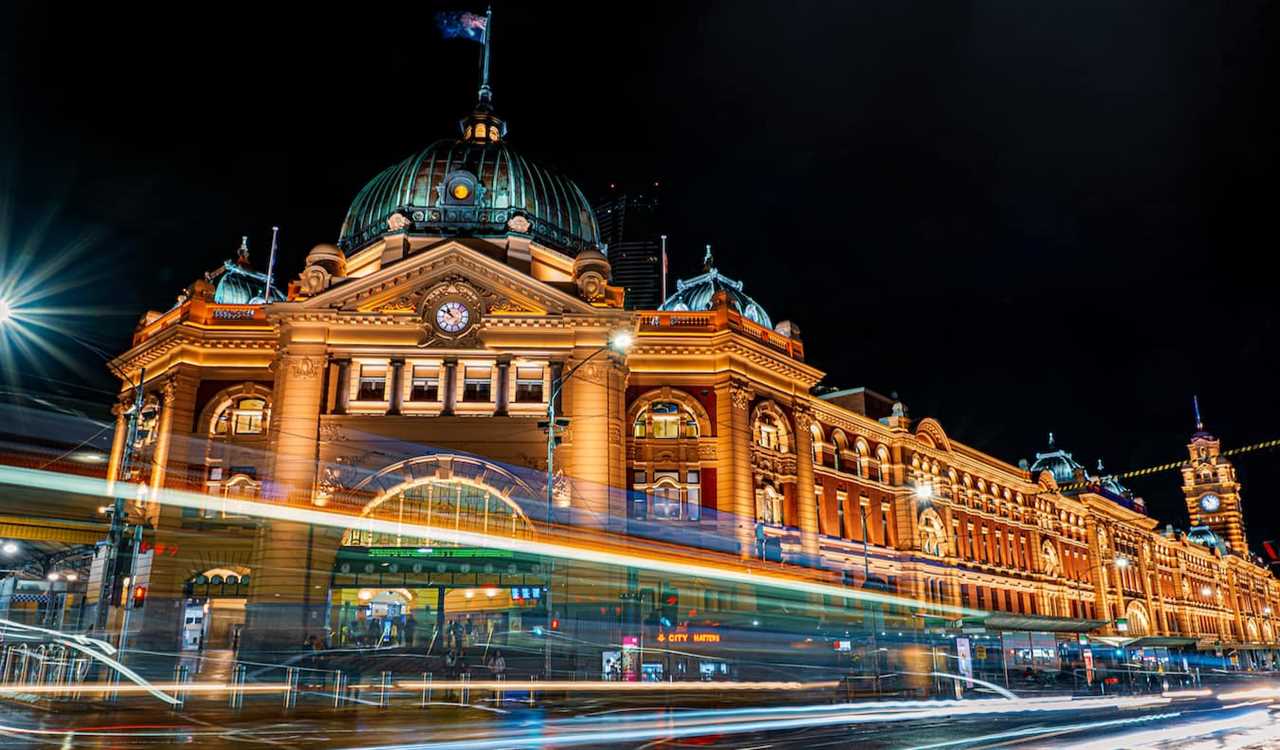 A long-exposure shot at night of the famous Flinders Station in Melbourne, Australia