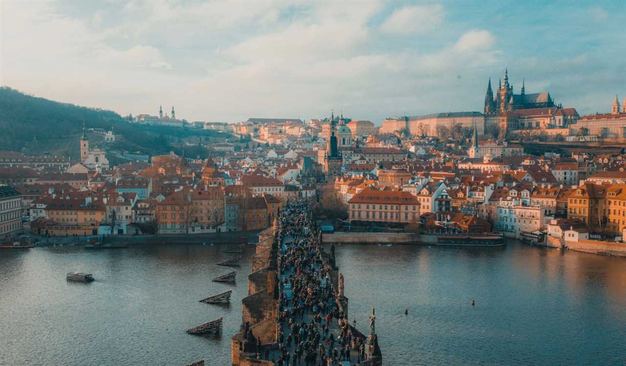 Tourists crowding a bridge in Prague, Czechia