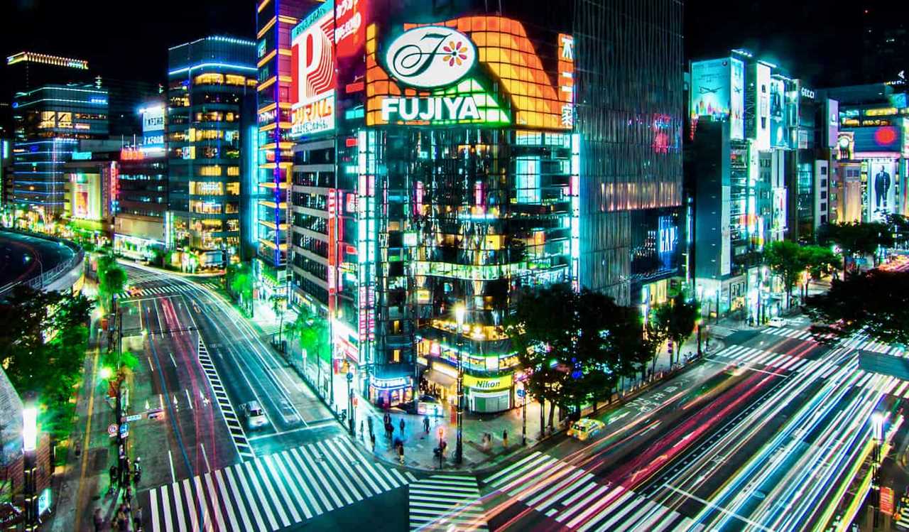 Cars traveling during a long exposure shot in the Ginza district of bustling Tokyo, Japan