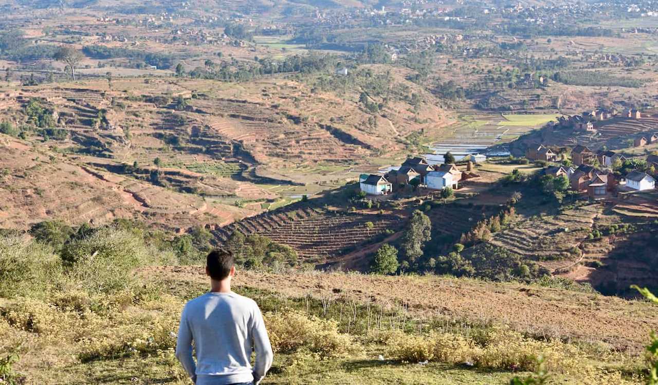 Nomadic Matt staring out over the arid landscape of Madagascar