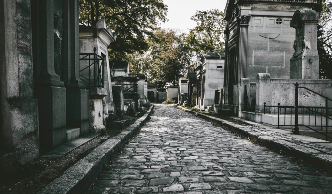 The cobblestones and mausoleums of the Pere Lachaise cemetery in Paris, France