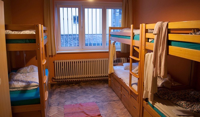 A set of bunk beds in a hostel dorm room