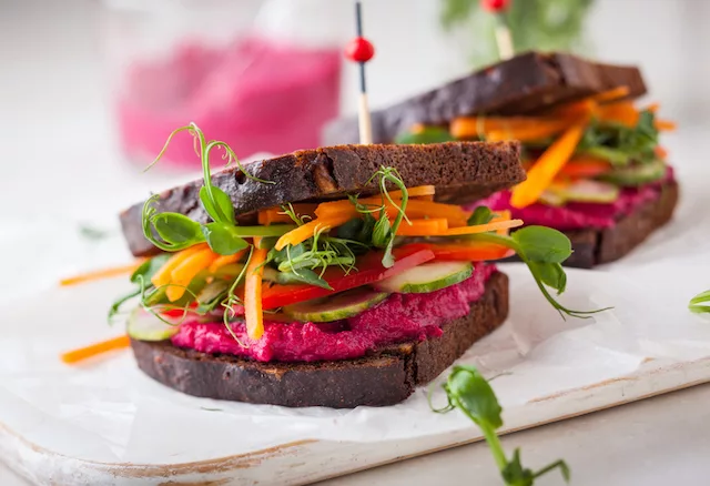 Beetroot hummus sandwich with fresh veggies