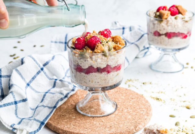 Small trifle dish with hemp cauliflower oats layered with berries. 