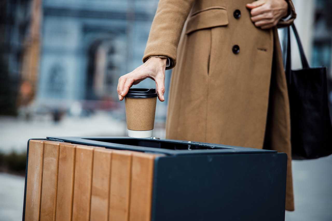 Coffee Cup Being Thrown Away | how much caffeine should you have a day