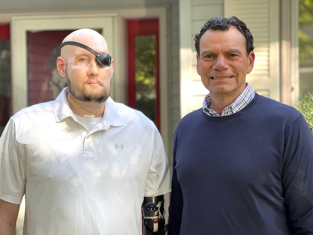 Dr. Eduardo Rodriguez with Aaron James after his face and eye transplant.