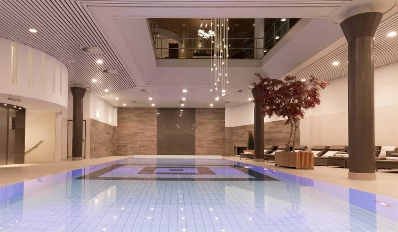 Luxurious indoor pool with a skylight at Hotel Okura in Amsterdam, the Netherlands