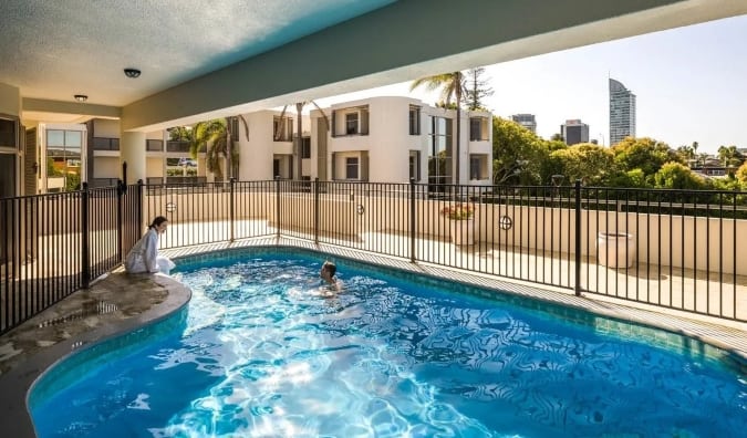 Outdoor pool at Carnmore Takapuna hotel in Auckland, New Zealand