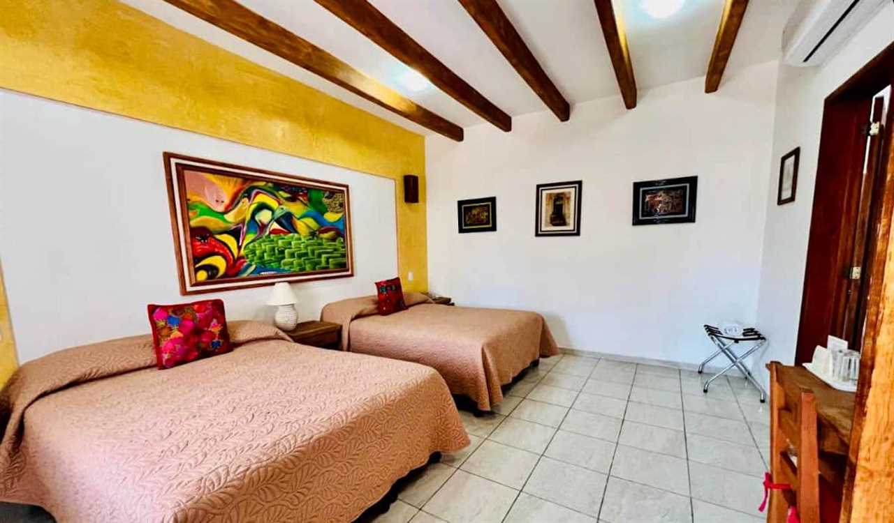 A large, airy hotel room with lots of space at Los Arrayanes hotel in Oaxaca, Mexico