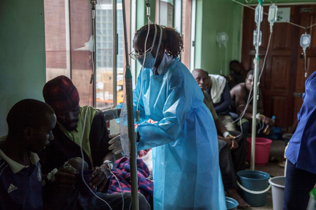 A health worker takes care of patients at a cholera treatment center of a hospital in Lusaka, Zambia, Jan. 5, 2024.  