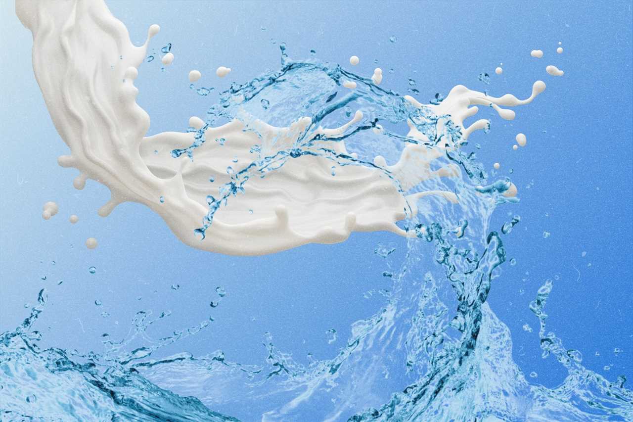 A wave of milk and a wave of water splashing across the screen