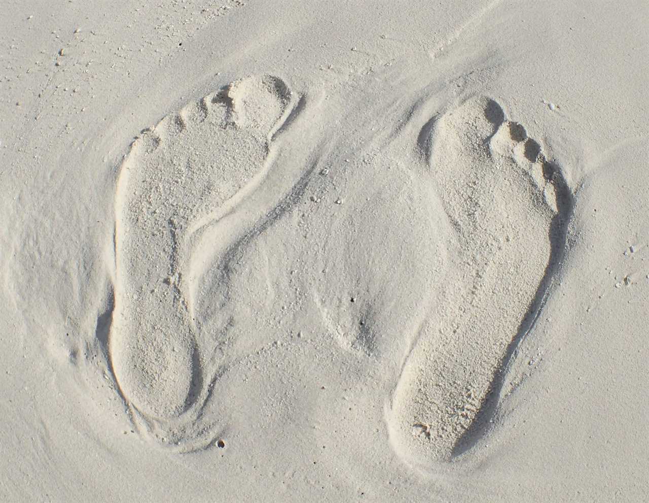 Footprints in the sand on the beach, Maldives