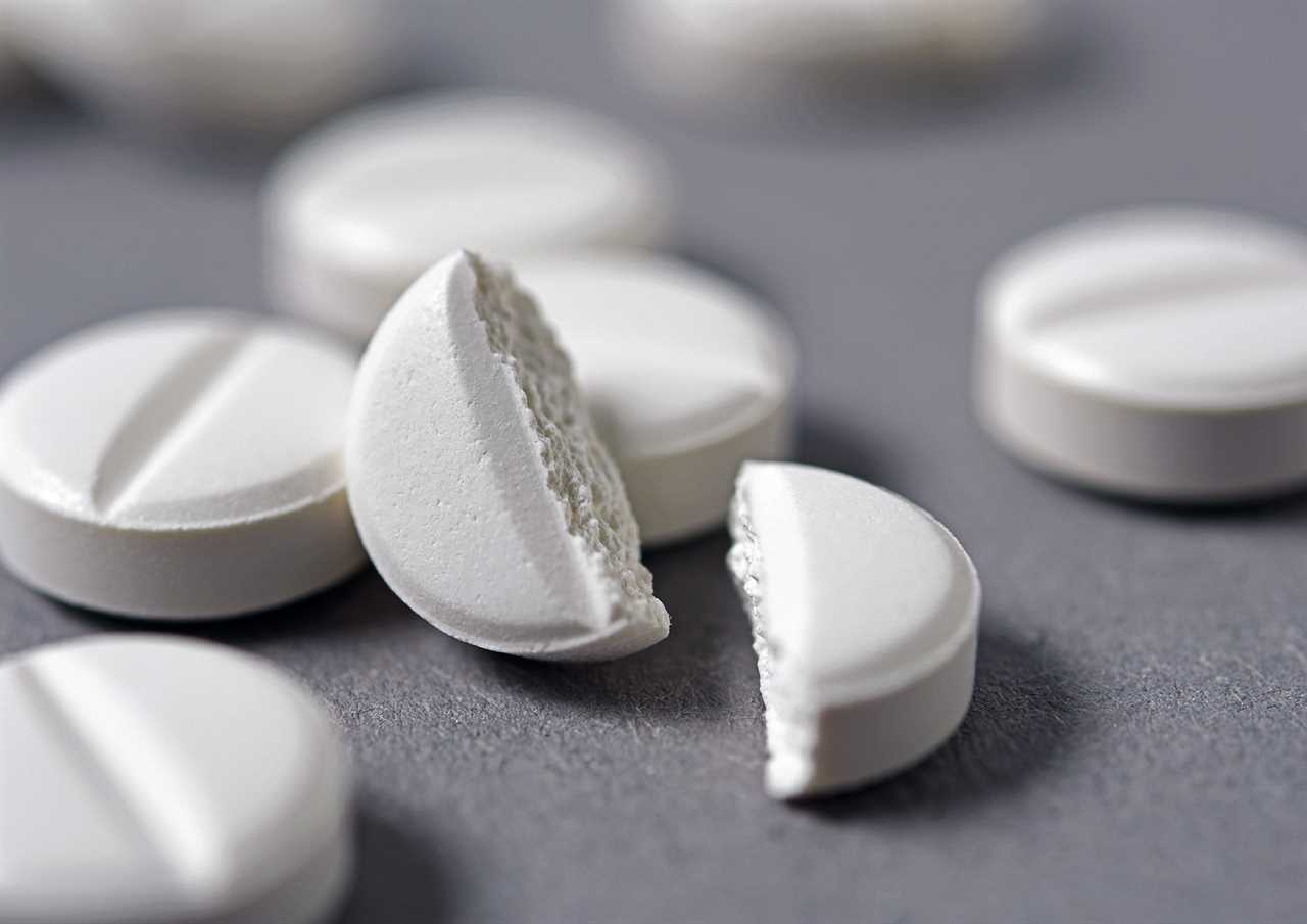 Close-Up Of Pills On Table