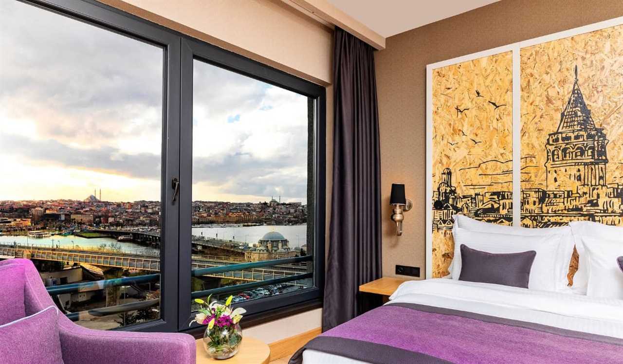 A bright guest room with wooden, Ottoman-style furniture at Celine Hotel Ottoman Mansion in Istanbul, Turkey