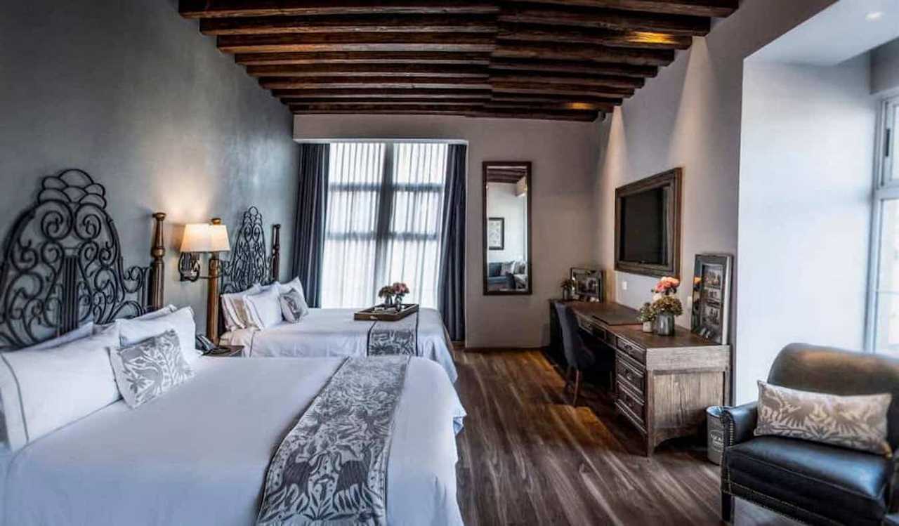 A stylish, moody hotel room at the Zocalo Central Mexico City Hotel in Mexico City