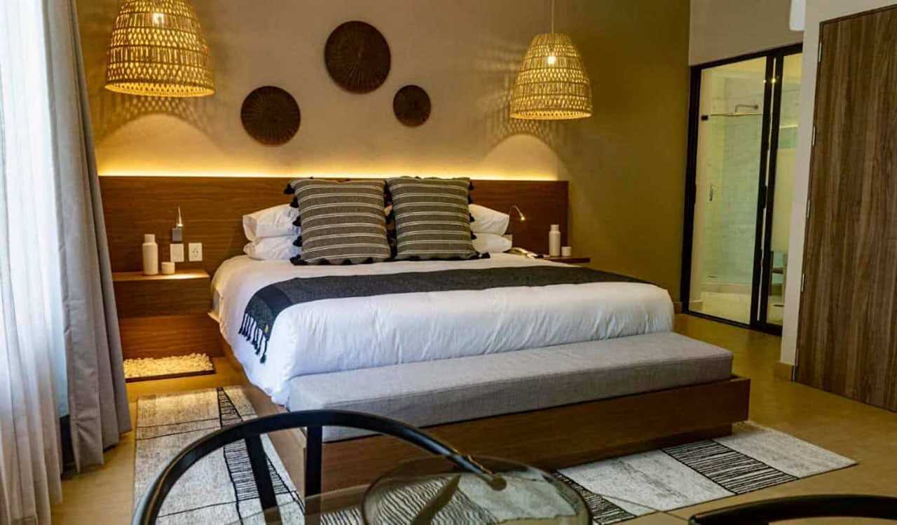 A huge, comfortable bed at the Agata Hotel in Mexico City, Mexico