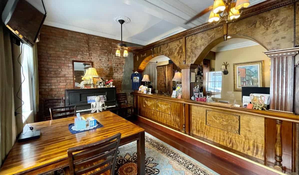 Historic wood check in desk at Villa Convento hotel in New Orleans, Louisiana