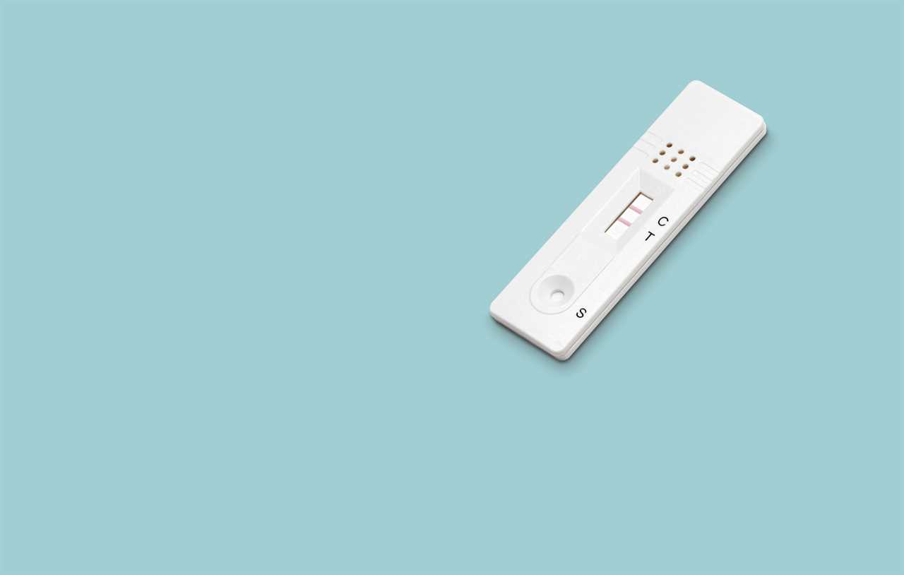 Positive Antigen rapid test for Covid-19 on a blue background