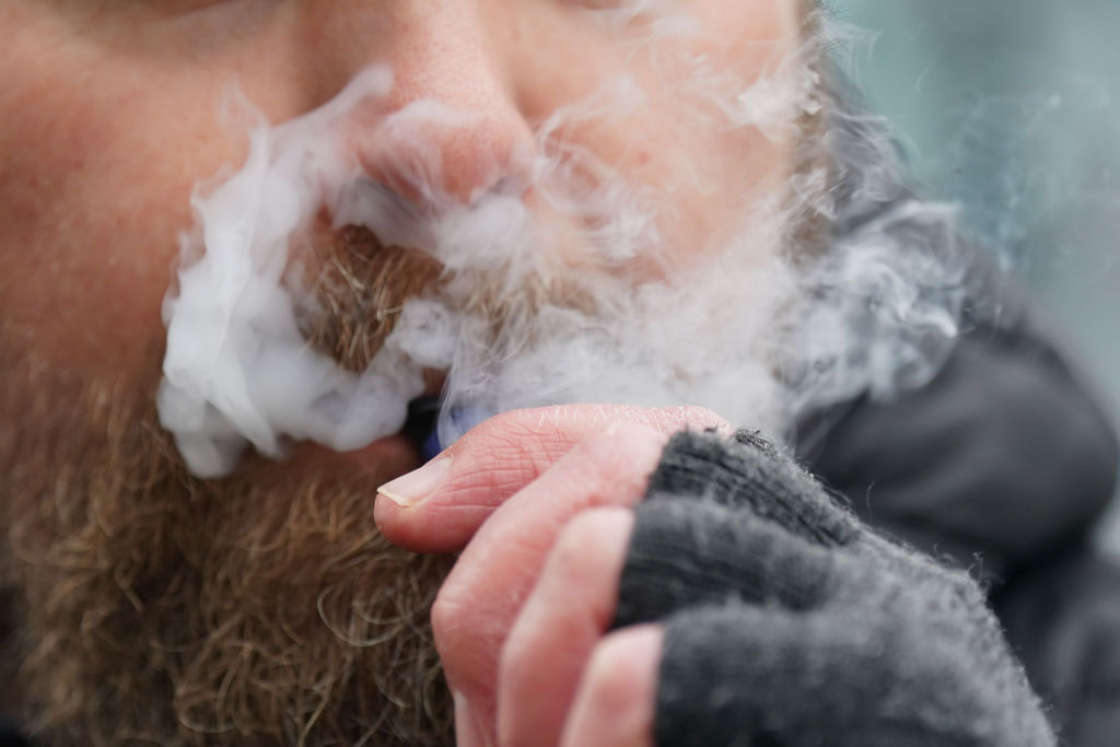 A man vaping.