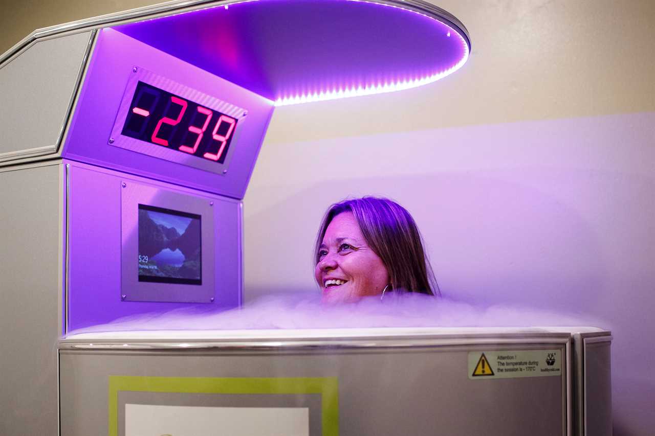 Amy Bateson stands in a Cryotherapy chamber while the temperature is lowered to negative 239 degrees Fahrenheit at the Andersonville cryotherapy and athletic recovery center in Chicago on May 30, 2019.