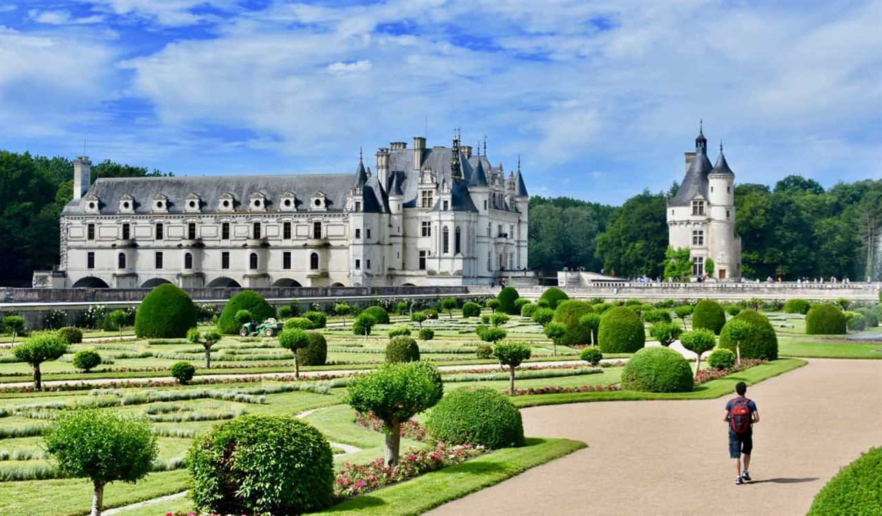 Nomadic Matt walking towards a castle in the Loire Valley, France