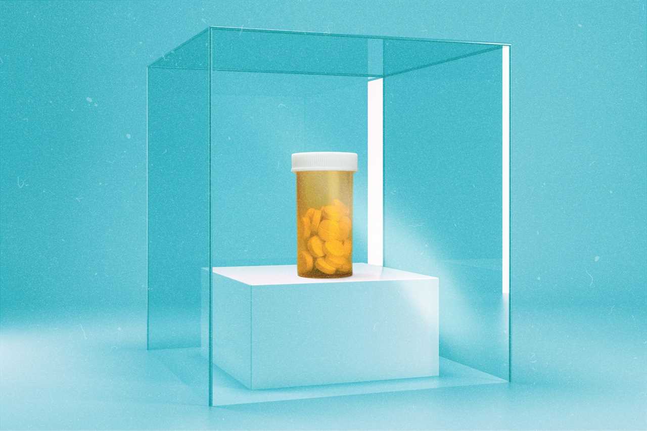 A bottle of bills locked inside of a glass box