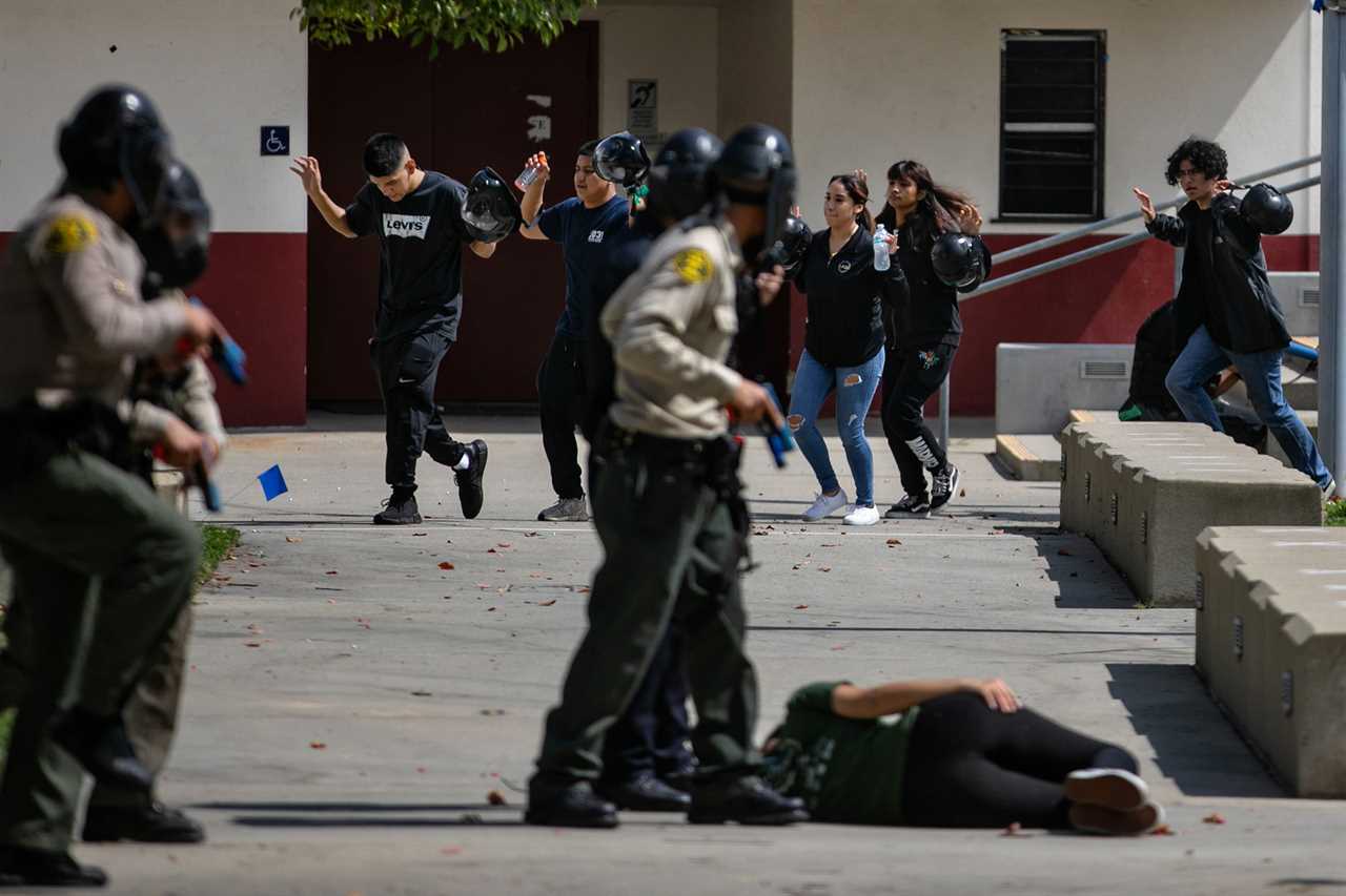 The Los Angeles County Sheriff's Department take part in active shooter training drills at Rosemead High School