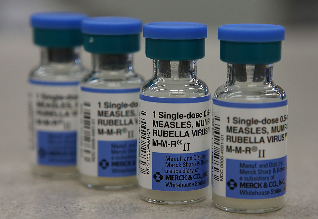 Wials of measles, mumps and rubella vaccine are displayed on a counter at a Walgreens Pharmacy on Jan. 26, 2015.
